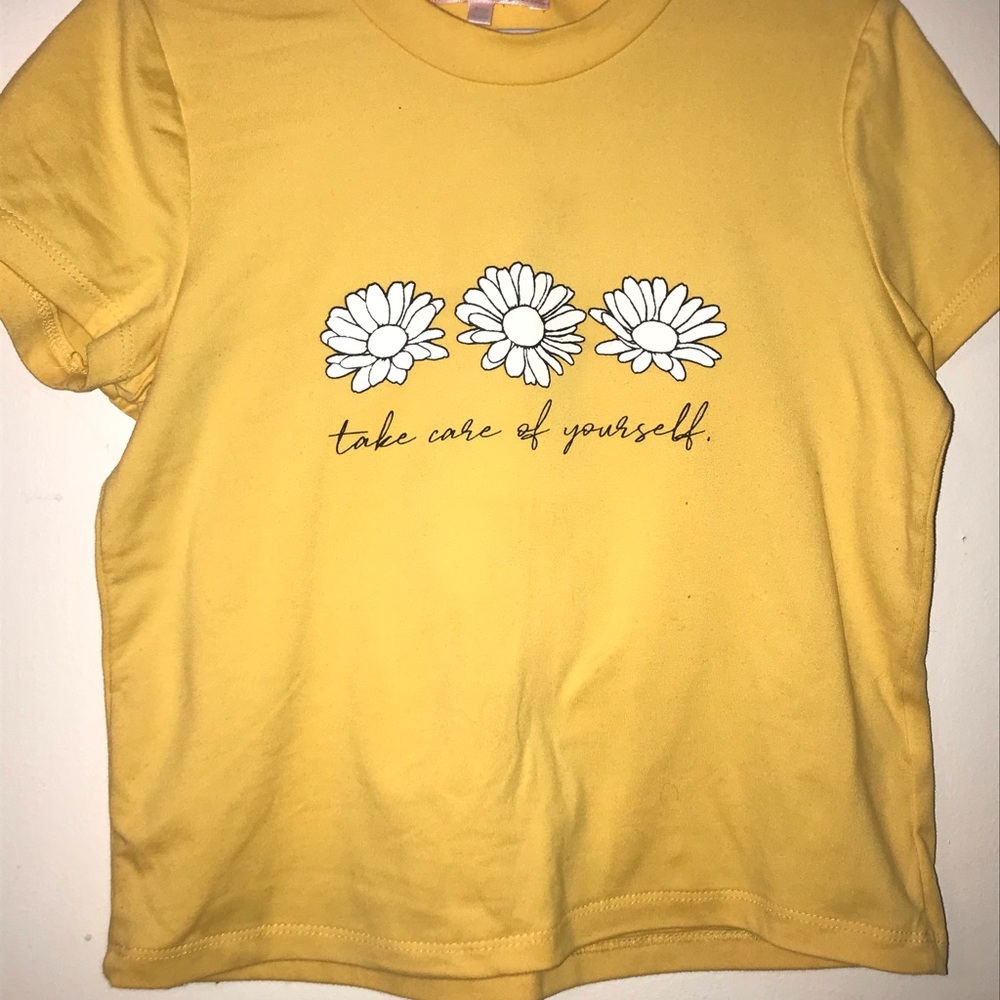 A cute colored musterd shirt with flower prints🌼